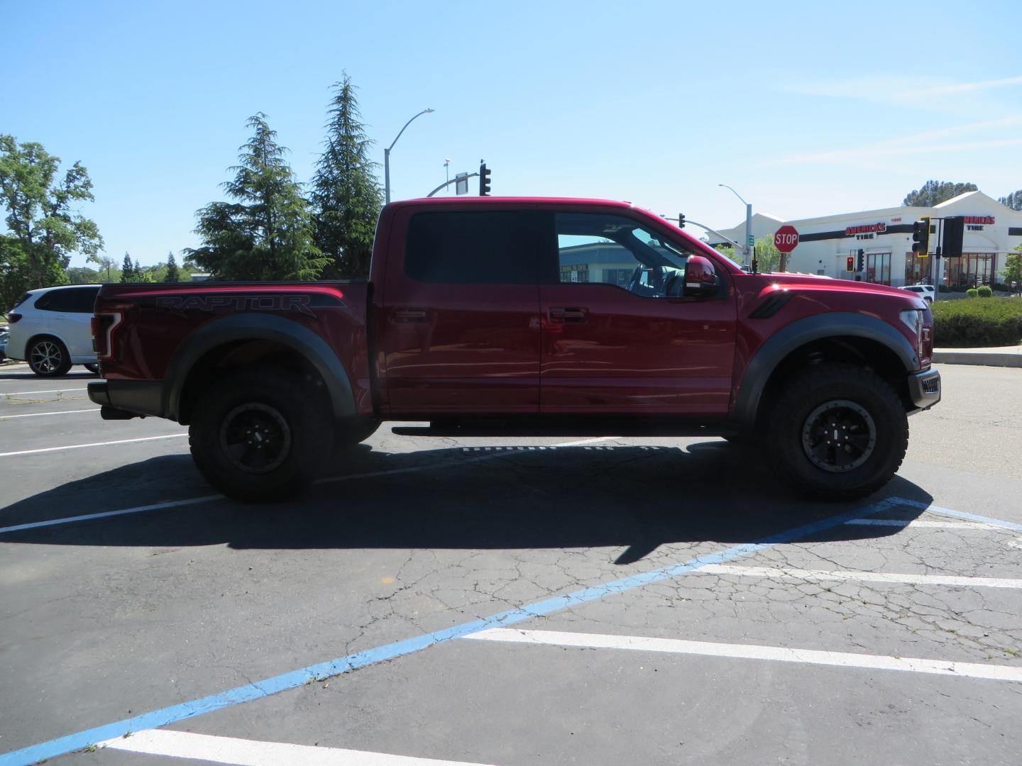 2018 MAROON /BLACK Ford F-150 Raptor SuperCrew 4WD (1FTFW1RG0JF) with an 3.5L engine, automatic transmission, located at 2630 Grass Valley Highway, Auburn, CA, 95603, (530) 508-5100, 38.937893, -121.095482 - Clean Raptor featuring a set of Eibach front springs, 37" BFG KO2 tires, and led fog lights. - Photo#3